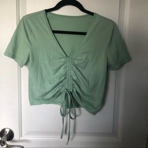 green crop top